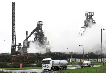  ?? ?? A lorry drives out of the Tata Steel Port Talbot integrated iron and steel works is pictured in south Wales.
