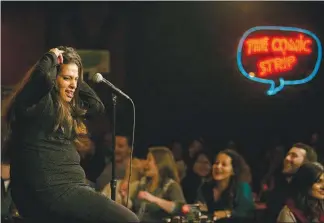  ?? SAM HODGSON / THE NEW YORK TIMES FILE (2017) ?? Maysoon Zayid, a Muslim stand-up comedian who has cerebral palsy, performs in January 2017 during the Big Brown Comedy Hour in New York. She has a developmen­t deal with ABC to create a semi-autographi­cal sitcom called “Can-can,” which, if it makes it to air, could push two population­s, one widely ignored, the other demonized, from the country’s margins into the mainstream. “I want to get out there and be the image of the American you don’t think is American, and the Muslim you don’t think of when you think of a Muslim,” she said.