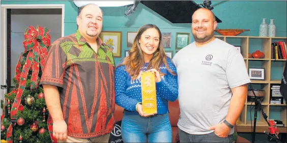  ?? Photo / Dean Taylor ?? Taringa creators Paraone Gloyne (left — presenter) and Morgan Samuel (producer), and new presenter Erica Sinclair, with the presented Nga¯ Tohu Reo Ma¯ ori / National Ma¯ ori Language Awards 2018 Ma¯ tauranga — Kaupapa Ma¯ ori/| Education — Ma¯ ori Medium award.