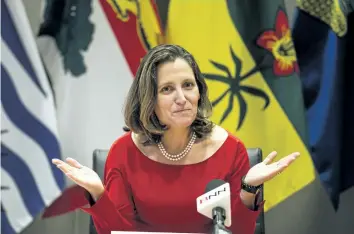  ?? CHRISTOPHE­R KATSAROV/THE CANADIAN PRESS ?? Minister of Foreign Affairs Chrystia Freeland leads the NAFTA council in discussion on the modernizat­ion of the North American Free Trade Agreement, in Toronto on Friday.
