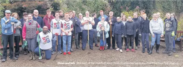  ??  ?? Clean and tidy Members of the Church of Jesus Christ of Latter-day Saints at a recent Barshaw Park clean-up