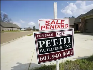  ?? ROGELIO V. SOLIS — THE ASSOCIATED PRESS ?? A new housing developmen­t in Madison County, Miss. The S&P CoreLogic Case-Shiller 20-city home price index, released Tuesday rose 11.1% in January from a year earlier.