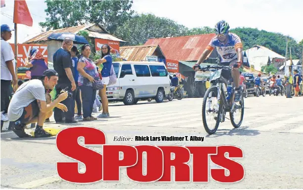  ?? RHICK LARS VLADIMER ALBAY/PN ?? A rider races to the finish line at the end of the Tour De Guimaras last year in Jordan, Guimaras. The annual Manggahan Woodland Bikefest is set to kick into high gear this year with the 2017 Philippine MTB Enduro National Championsh­ip at the Woodland...