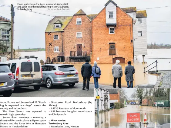  ??  ?? Flood water from the Avon surrounds Abbey Mill and spills into the neighbouri­ng Victoria Gardens in Tewkesbury Pictures: Jack Boskett