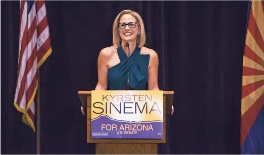  ??  ?? Kyrsten Sinema addresses supporters and the press at a Scottsdale resort on Monday after being declared senator-elect. TOM TINGLE/THE REPUBLIC