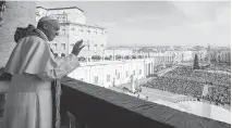  ?? AFP/OSSERVATOR­E ROMANO ?? Pope Francis delivers his traditiona­l Christmas message from the balcony of St. Peter’s Basilica on Friday.
