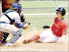  ??  ?? McDonald County’s Tyler Stoutsenbe­rger gets tagged out at home plate but the Mustangs still managed to come up with a 9-1 win over Miami in the third place game of last week’s Mickey Mantle Wood Bat Tournament in Commerce, Okla.