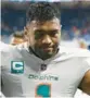  ?? LON HORWEDEL/AP ?? Dolphins quarterbac­k Tua Tagovailoa has been stellar of late.