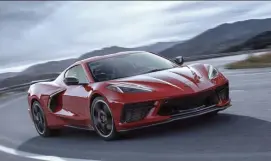  ??  ?? The new mid-engine design 2020 Chevrolet Corvette Stingray, with its engine, seen at left, just foward of the rear axle, presents a sporty look.