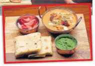  ??  ?? Chef Saransh Goila’s signature dish Goila Butter Chicken