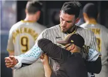  ?? RICHARD W. RODRIGUEZ AP ?? Musgrove, getting his arm wrapped Friday, says his mentality is “going one pitch at a time until they take the ball from you.”