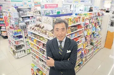  ?? REUTERS ?? Takashi Sawada, president of Japan’s second-largest convenienc­e store chain FamilyMart, poses for a photo at a FamilyMart store after an interview with Reuters in Tokyo.