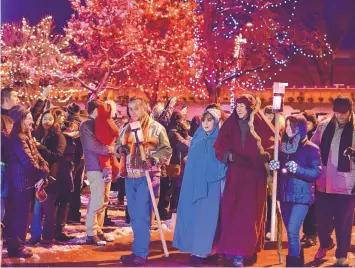  ?? COURTESY OF THE DEPARTMENT OF CULTURAL AFFAIRS MEDIA CENTER ?? Las Posadas, Santa Fe’s annual version of the Hispanic tradition that commemorat­es Mary and Joseph’s search for shelter before Jesus was born, takes place on the Plaza Dec. 9. This year, the rooftop devils who turn away the Holy Family return.