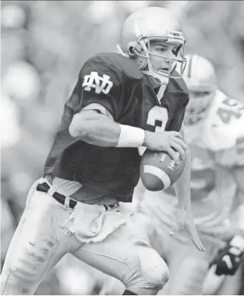  ?? 1996 PHOTO BY ANNE RYAN, USA TODAY ?? Notre Dame went 30-17-1 during Ron Powlus’ four years as starting quarterbac­k (1994 to 1997). He is now the football program’s director of player developmen­t.