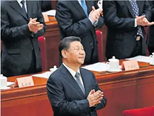  ?? [APA/AFP/Greg Baker] ?? Chinas Staatschef wird immer mächtiger: Xi Jinping beim Volkskongr­ess.