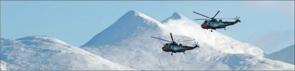  ?? Photograph: Kevin McGlynn ?? Three Sea King helicopter­s completed their last flypast over Oban Bay on Thursday, where members of the public joined Oban Mountain Rescue Team, as well as members of the police, ambulance and
coastguard, gathered on the North Pier as the choppers flew overhead and then turned south over Ben Cruachan.