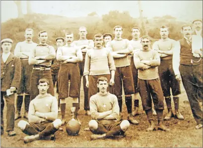  ??  ?? Ardrishaig Kharki Rangers, Nicol Challenge Cup winners 1901 – as named by Robert Bruce in 1977. From left: Duncan McCallum, Jock Dewar, William McPhail, James McVean, A McTavish, Robert Bruce (Mr Bruce’s uncle), Jock MacVicar, A MacGregor (trainer), cousins Angus and Dougal Law, John Hamilton, D Campbell, Walter McEwan and, sitting to the right of the cup, John Bruce, who was Mr Bruce’s father.