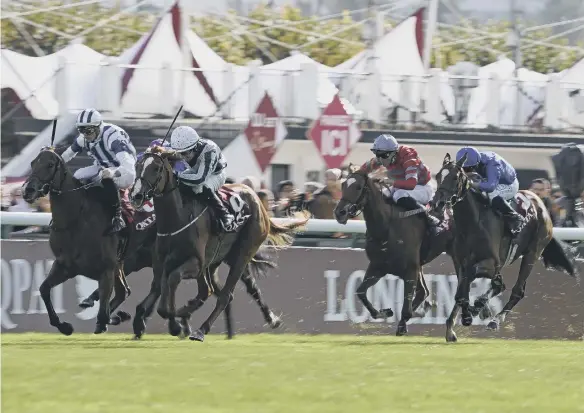  ??  ?? Shane Foley riding Albigna (second left) to win The Qatar Prix Marcel Boussac during Prix de l’Arc de Triomphe at Paris in October.