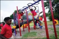  ?? ?? Students from Thomas Leadership Academy play on the school’s playground in Eatonville, Fla., Aug. 23, 2023. (AP)