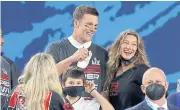  ?? AFP ?? Tom Brady celebrates with his wife Gisele Bundchen after winning the 2021 Super Bowl last month.