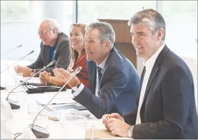  ?? $1 1)050 ?? P.E.I. Premier Wade MacLauchla­n, left, Francyne Joe, president, Native Women’s Associatio­n of Canada, Manitoba Premier Brian Pallister and Nova Scotia Premier Stephen McNeil take part in the premiers meeting in Edmonton Alta.