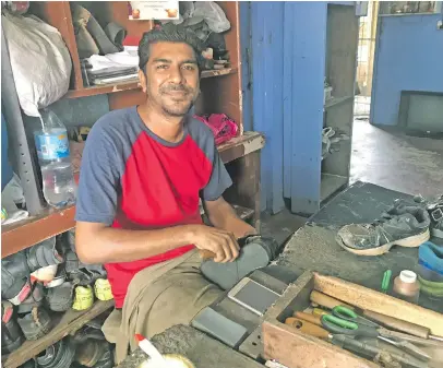  ?? Photo: Lusiana Banuve ?? Arvind Kumar inside his shoe repair shop in Ba town.
