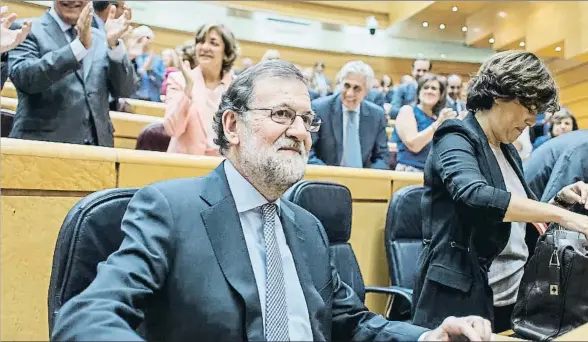  ?? DANI DUCH ?? Mariano Rajoy y Soraya Sáenz de Santamaría respondier­on preguntas en el Senado sobre el proceso independen­tista