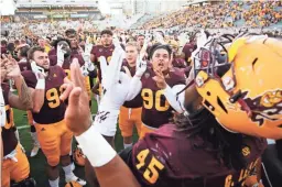  ??  ?? Arizona State celebrates after defeating Utah on Saturday at Sun Devil Stadium.