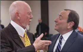  ?? CP PHOTO ?? NHL commission­er Gary Bettman (right) chats with Don Cherry at a meeting of The Canadian Club of Toronto in 2014. Cherry put Bettman on the spot about expanding the league back into Quebec City.