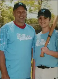  ?? SUBMITTED ?? McMinn Baseball League President and coach Bob Lonchor poses with his son Sam in 2017.