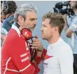  ?? Foto: dpa ?? Teamchef Maurizio Arrivabene Sebastian Vettel beruhigen. musste