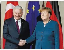  ??  ?? Yildirim und Merkel bei einer Begegnung im Vorjahr
