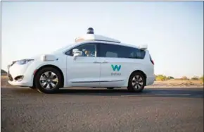  ?? O’HARA/THE NEW YORK TIMES CAITLIN ?? A Waymo vehicle during a demonstrat­ion in Chandler, Arizona, on June 2.