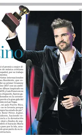  ?? AFP ?? Juanes recibe el gramófono por Mejor álbum de pop/rock ‘Mis planes son amarte’.