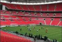  ??  ?? Wembley Stadium’s 30,000 steps will present a challenge for charity fundraiser­s from Glasgow City Council