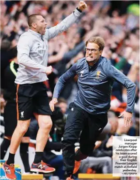  ??  ?? Liverpool manager Jurgen Klopp celebrates after his team scored a goal during their English Premier League match at Anfield yesterday. –