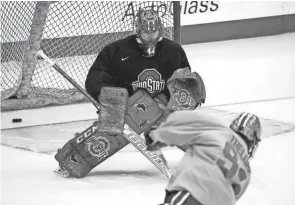  ?? COLUMBUS DISPATCH ?? This weekend, Ohio State goalie Jakub Dobes and the 15th-ranked Buckeyes face No. 13 Notre Dame in OSU’S only home series of January.