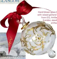  ??  ?? Hand-blown glass bauble with raised garland detail, from £12, Artifactua­lly (London, stand VG28; artifactua­lly. co.uk)