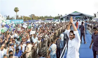  ?? ?? Chief Minister Y.S. Jagan Mohan Reddy greeting the crowd at the ‘Memantha Siddham’ election campaign in Kakinada on Friday.