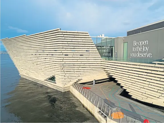  ??  ?? ‘Be open to the Joy you deserve’ has been placed on the side of V&A Dundee to spread the message of hope to people approachin­g the city.
