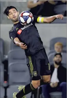  ?? Marcio Jose Sanchez Associated Press ?? CARLOS VELA, who exited LAFC’s opener with a quadriceps injury, will be a game-time decision, coach Bob Bradley says.