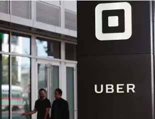  ??  ?? CALIFORNIA: This file photo shows the logo of the ride sharing service Uber in front of its headquarte­rs in San Francisco, California. —AFP