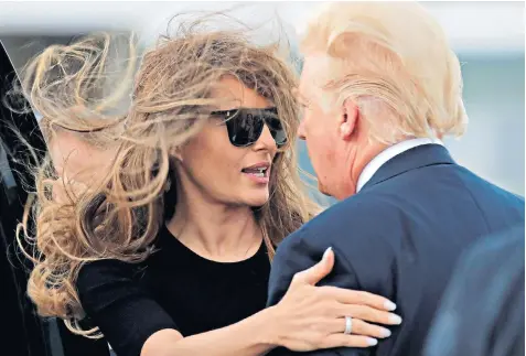  ??  ?? Happy landing: Melania and Donald Trump touch down in Maryland after their European trip