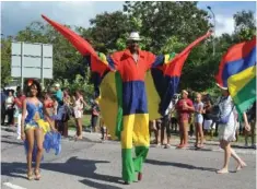  ??  ?? Le quadricolo­re mauricien a flotté bien haut à Victoria