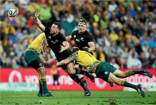  ?? GETTY IMAGES ?? All Blacks centre Ryan Crotty loses the ball during the 23-18 loss to the Wallabies in Brisbane on Saturday night.