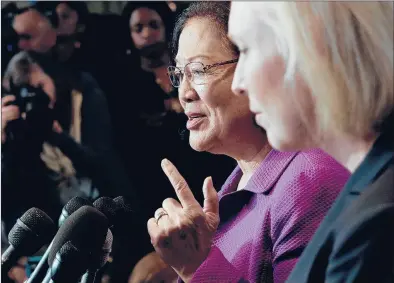  ?? ALEX WONG | GETTY IMAGES ?? U.S. SEN. MAZIE HIRONO, D-Hawaii, and Sen. Kirsten Gillibrand, D-N.Y., speak at a news conference on Thursday in support of Christine Blasey Ford, who has accused Supreme Court nominee Judge Brett Kavanaugh of sexual assault.