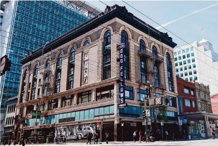  ?? Photos by Jessica Christian/The Chronicle ?? The Odd Fellows building, dedicated in 1909 at the corner of Seventh and Market streets in San Francisco, is for sale.