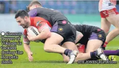  ?? STE JONES/ RLPIX.com ?? Connor Dwyer of Vikings is tackled during the Hornets clash