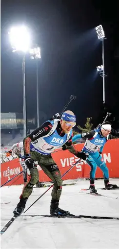  ?? Foto: dpa/Lee Jin-Man ?? Beim Testwettka­mpf in Pyeongchan­g dachte Erik Lesser (l.) nur an Ski, Wachs und Schnee. Vor Olympia kommt ihm Hiroshima in den Sinn.