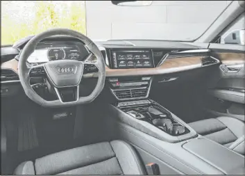  ?? ?? The premium-look dashboard has a configurab­le 12-3-inch driver’s digital instrument display located behind the flat-bottom steering wheel, and beside it there’s a straightfo­rward 10.1-inch touch-screen.